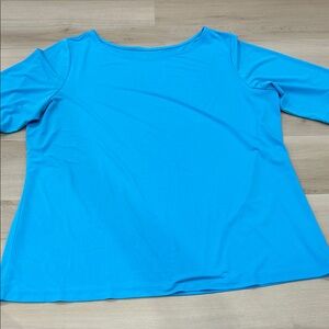 Susan Graver Scoop Neck Short Sleeve Top in Bright Turquoise